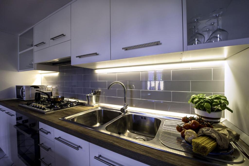 Kuchyň nebo kuchyňský kout v ubytování Casa Assunta B&B