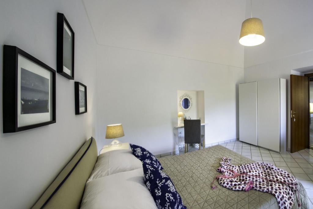 Postel nebo postele na pokoji v ubytování Casa Assunta B&B