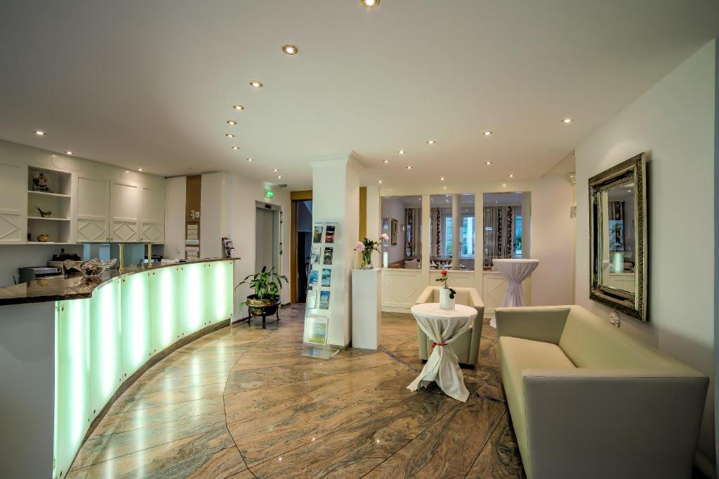 Kuchyň nebo kuchyňský kout v ubytování Hotel Central