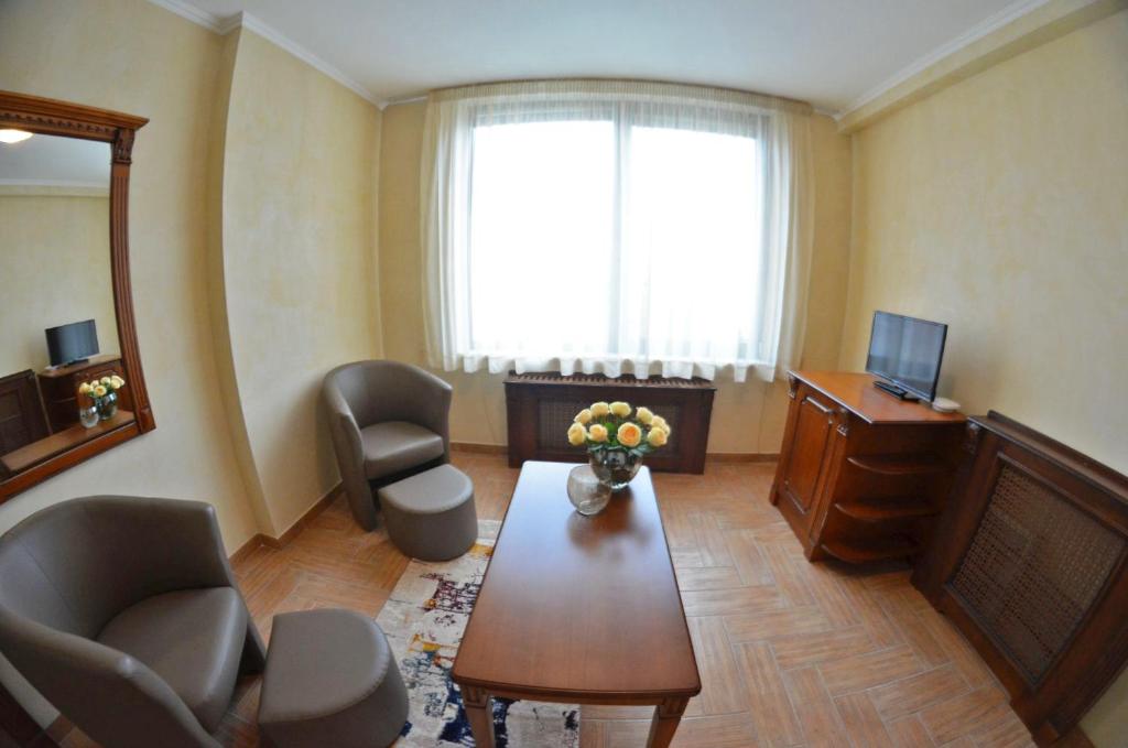 TV a/nebo společenská místnost v ubytování Central West Hotel