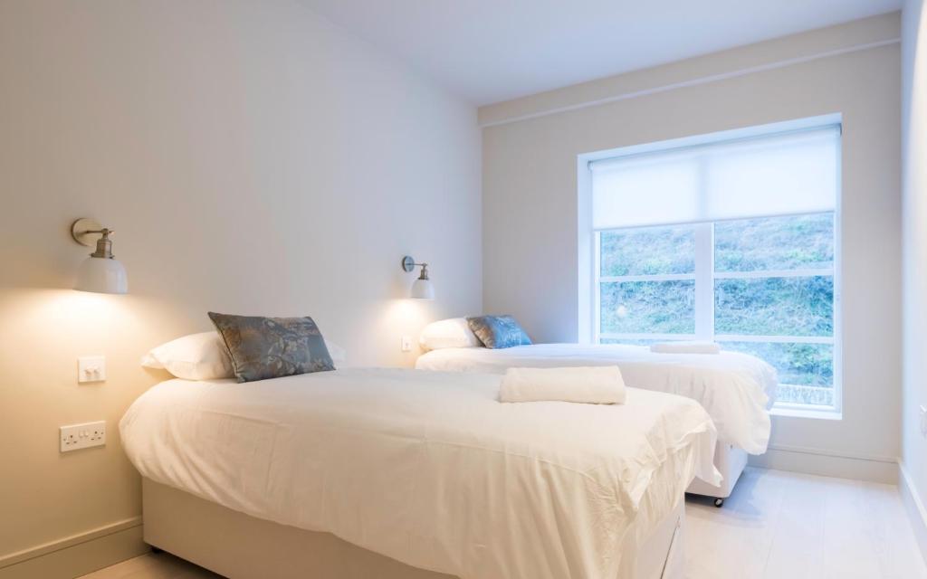 Кровать или кровати в номере Chalet Saunton