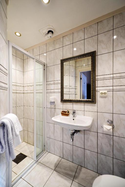 Koupelna v ubytování Kronen Gaard Hotel