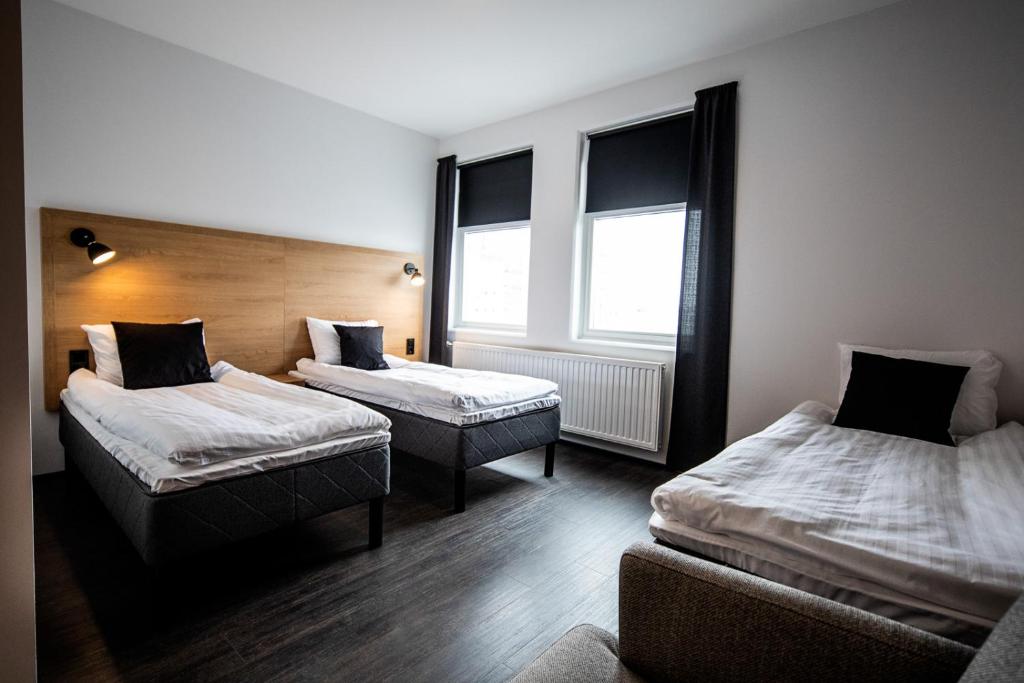 Vuode tai vuoteita majoituspaikassa 201 Hotel