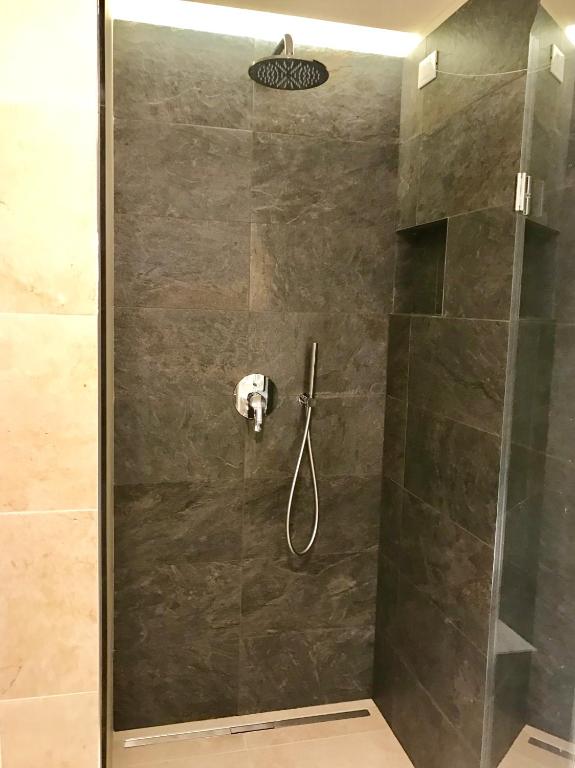 Koupelna v ubytování Hotel Ancora