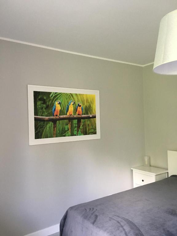 Postel nebo postele na pokoji v ubytování Apartament Na Urlop - Wisła Kamienna - Apartamenty z widokiem na panoramę Wisły