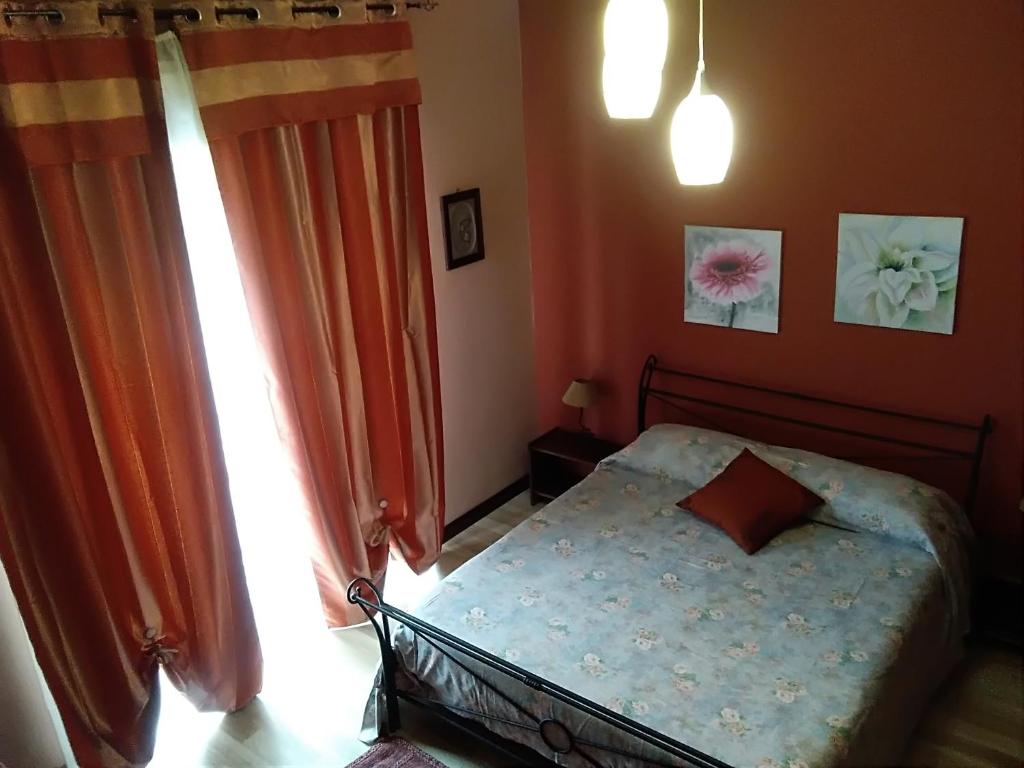 A bed or beds in a room at B&B "Al Calopinace"