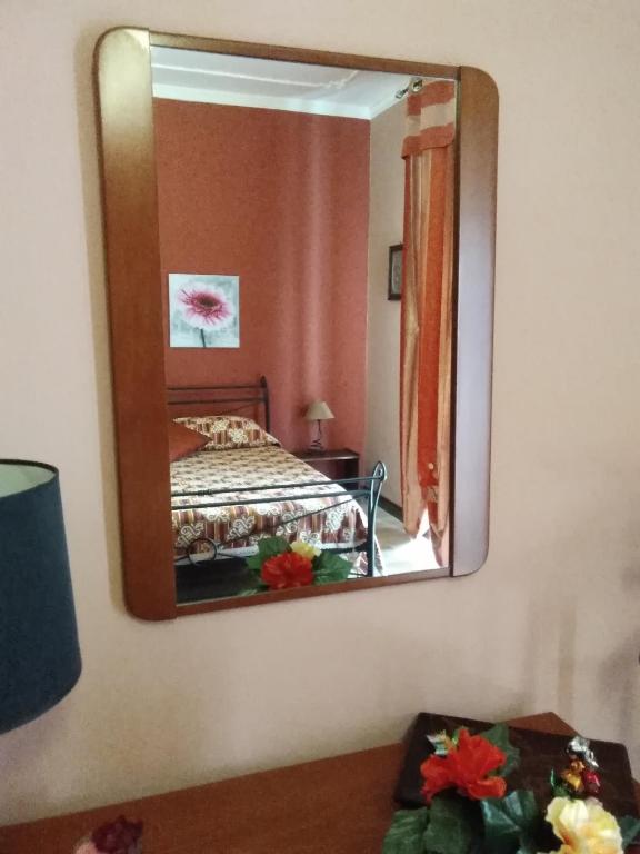 A bed or beds in a room at B&B "Al Calopinace"