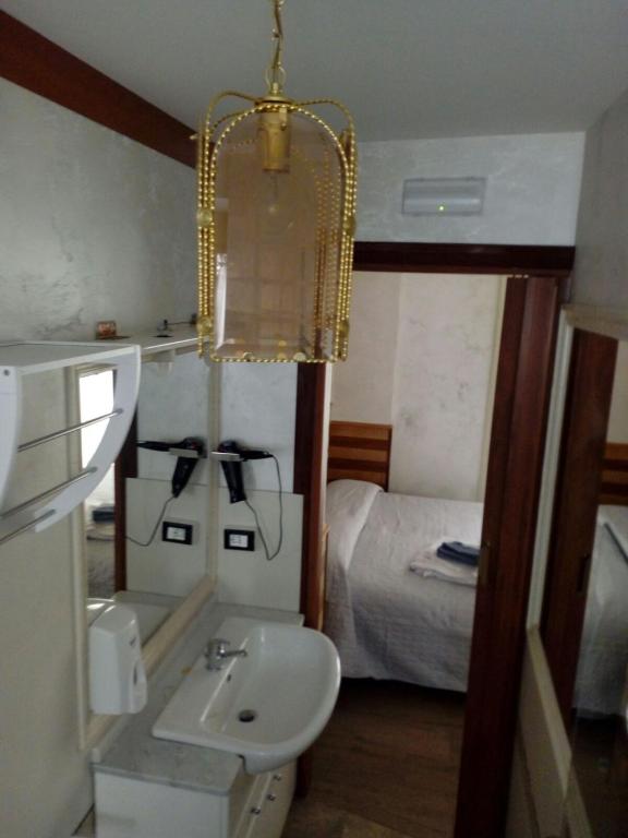 Posteľ alebo postele v izbe v ubytovaní B&B DA DILETTA