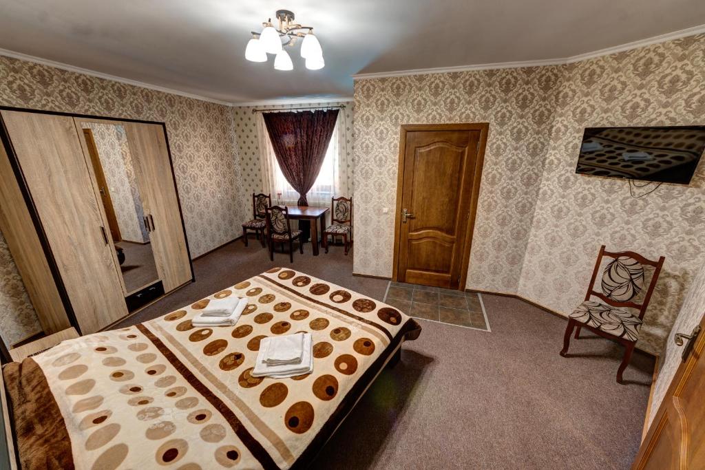 Postel nebo postele na pokoji v ubytování Villa Vlad & Spa