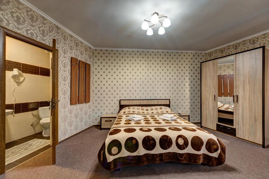 Postel nebo postele na pokoji v ubytování Villa Vlad & Spa