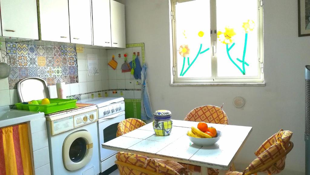 A kitchen or kitchenette at Casa Elena Al Duomo