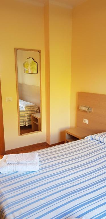 Postel nebo postele na pokoji v ubytování Marasusa Floreal