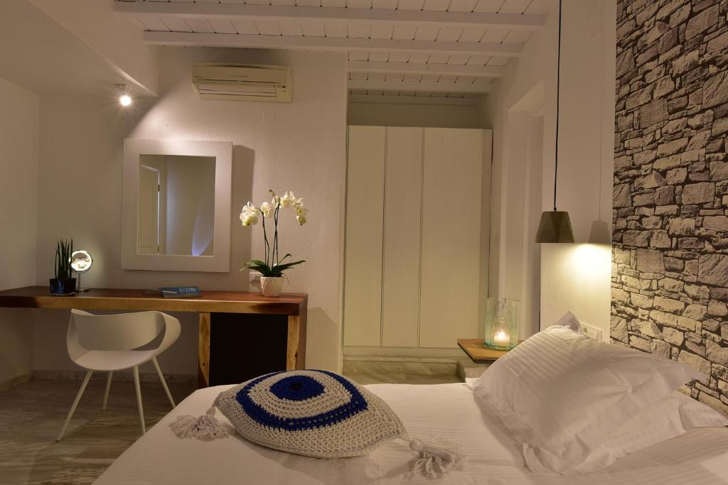 Postel nebo postele na pokoji v ubytování Hermes Mykonos Hotel
