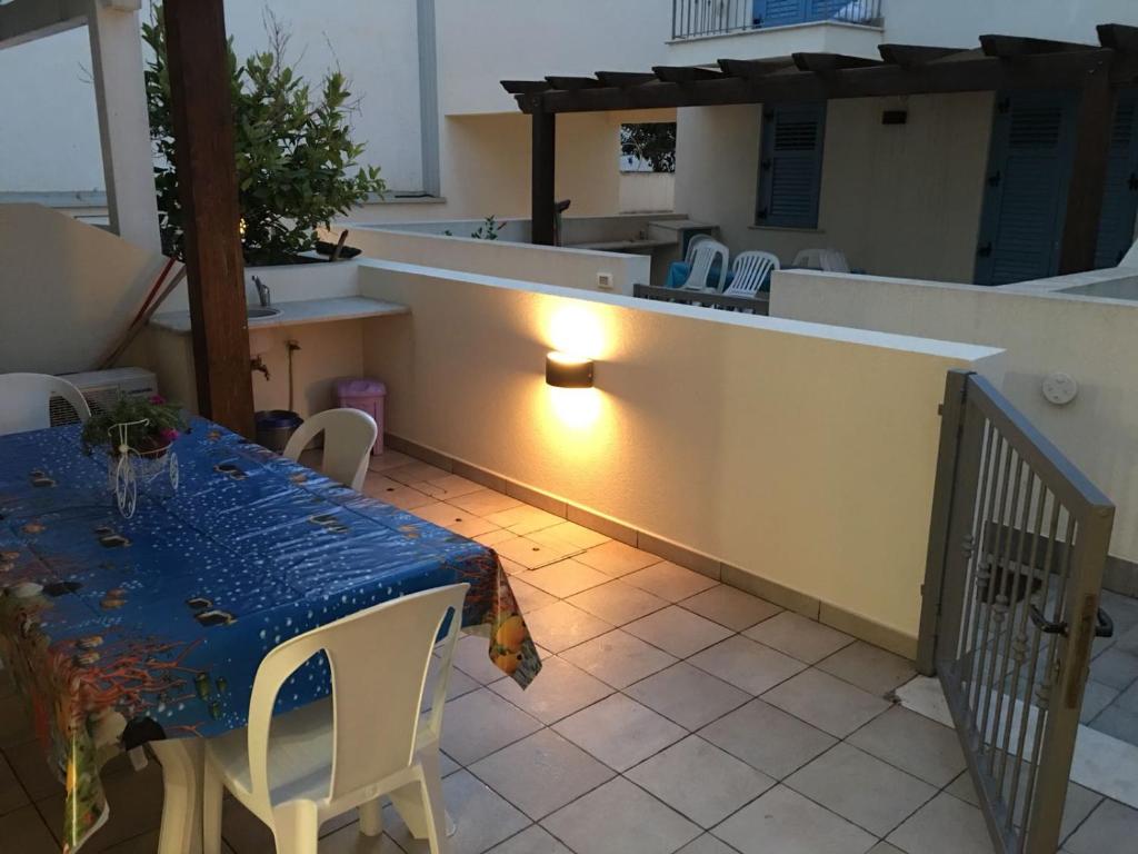 Balkon lub taras w obiekcie appartamento residence via giardini Acquamarina