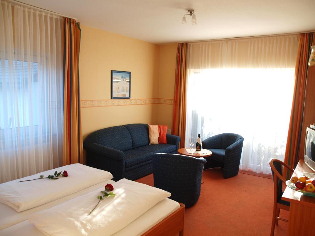 Posezení v ubytování Altes Doktorhaus - Hotel Garni