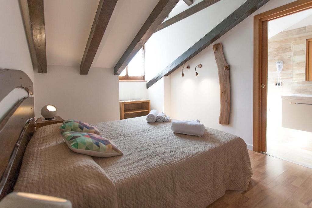 Postel nebo postele na pokoji v ubytování Grand Hotel Gortani