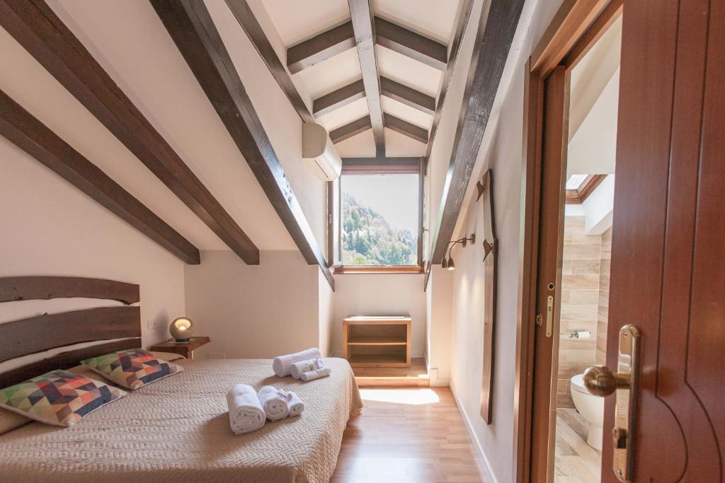 Postel nebo postele na pokoji v ubytování Grand Hotel Gortani