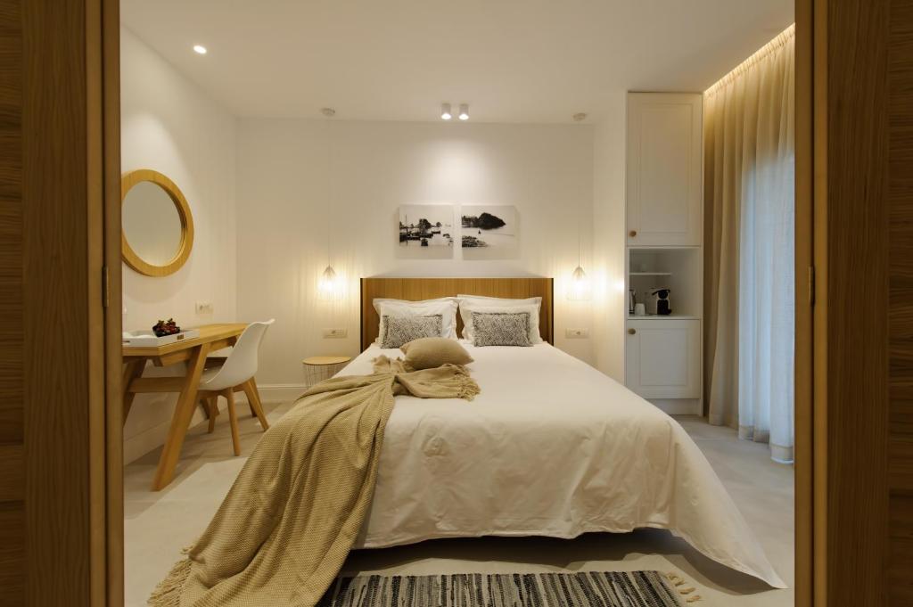Postel nebo postele na pokoji v ubytování Alfa Hotel