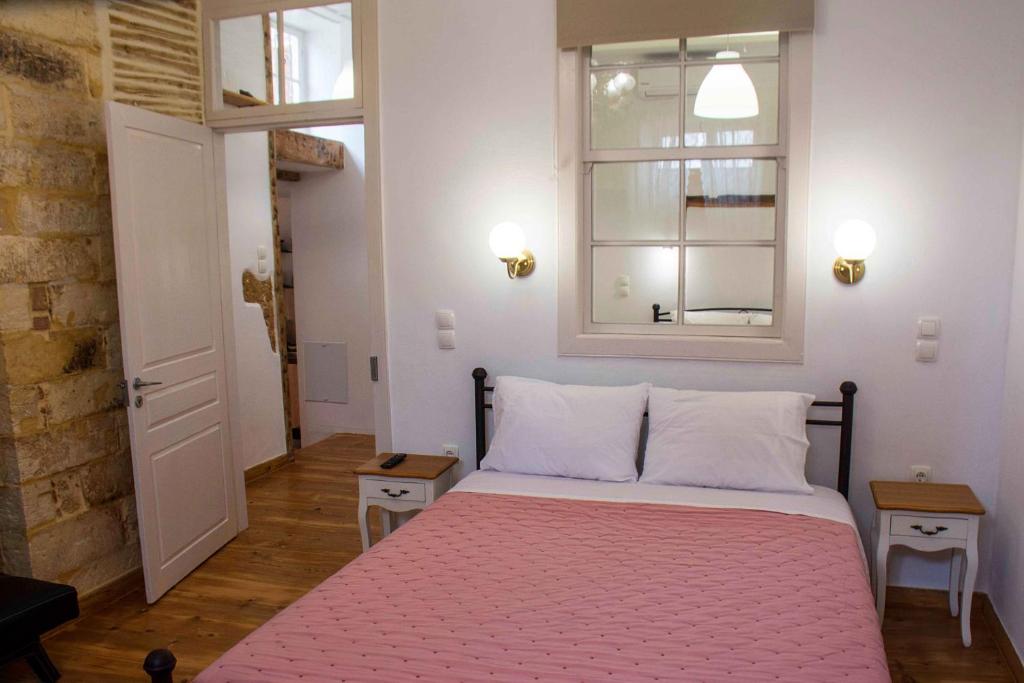 Postel nebo postele na pokoji v ubytování Green Door Apartment