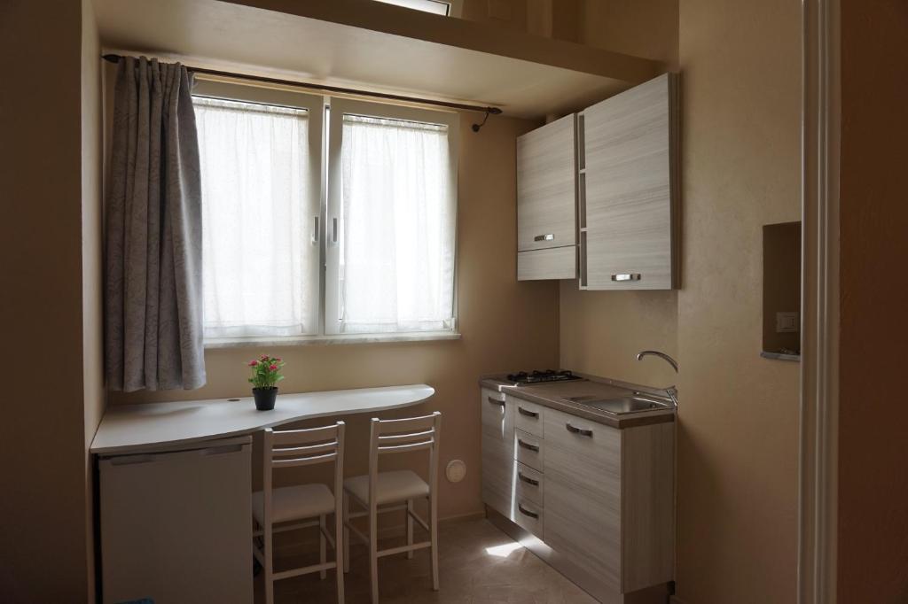 A kitchen or kitchenette at Dimora della Nonna