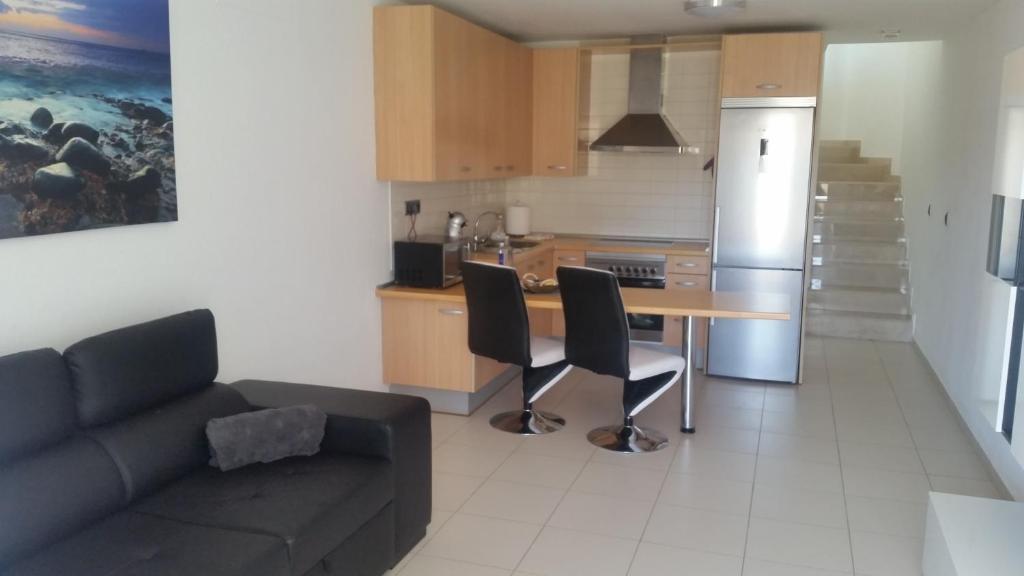 Kuchyň nebo kuchyňský kout v ubytování Él Rome Duplex