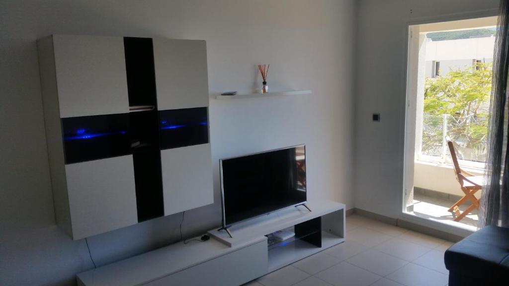 TV a/nebo společenská místnost v ubytování Él Rome Duplex