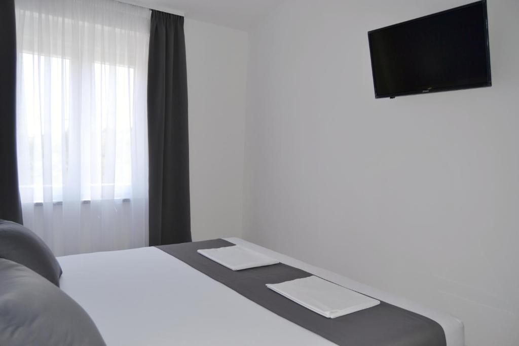 Televízia a/alebo spoločenská miestnosť v ubytovaní VILLA ŠUŠANJ 0
