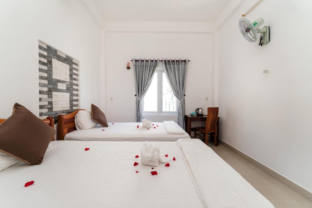 Postel nebo postele na pokoji v ubytování Horizon Homestay Hoi An