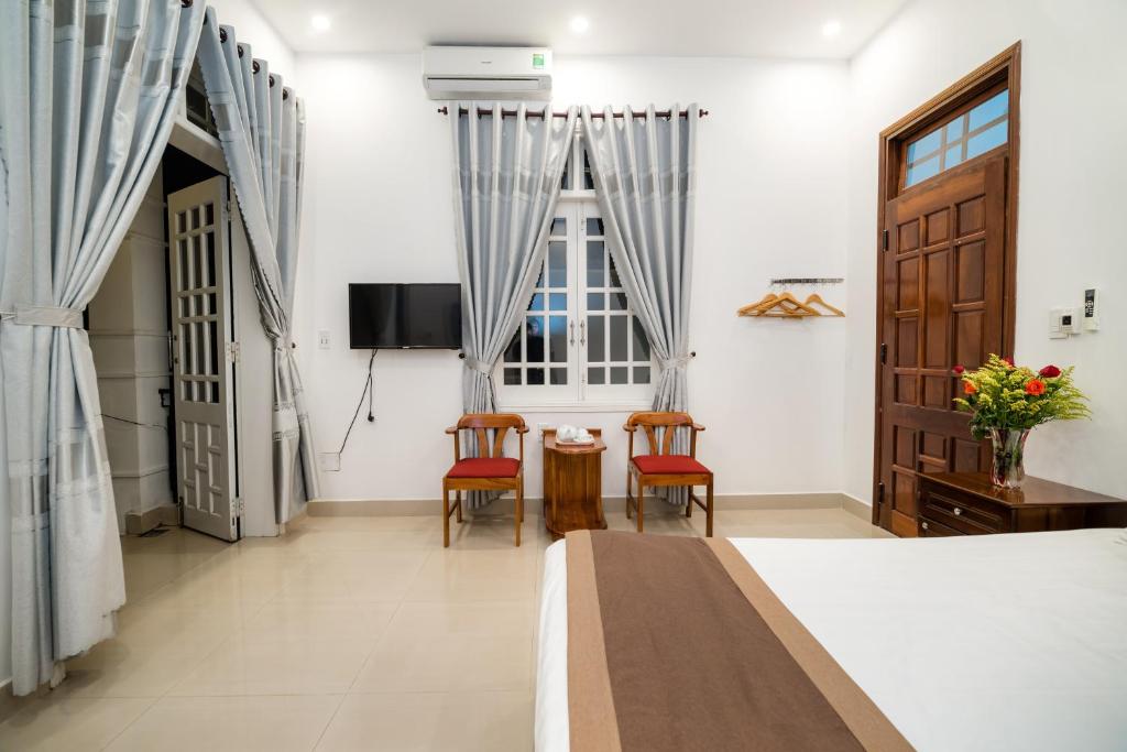 TV a/nebo společenská místnost v ubytování Horizon Homestay Hoi An