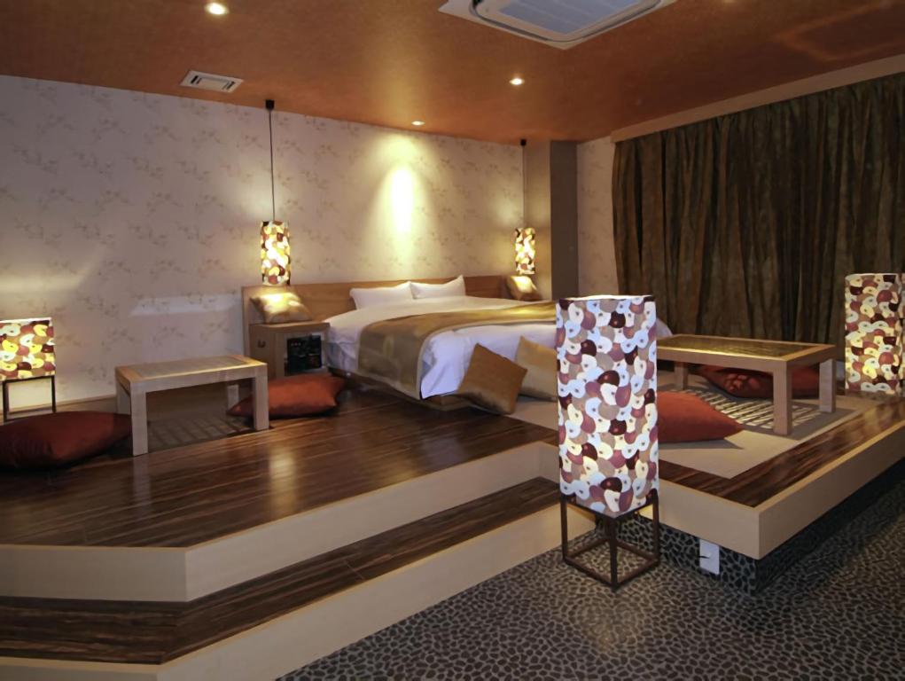 Postel nebo postele na pokoji v ubytování Hotel Cuna Kyoto Love Hotel