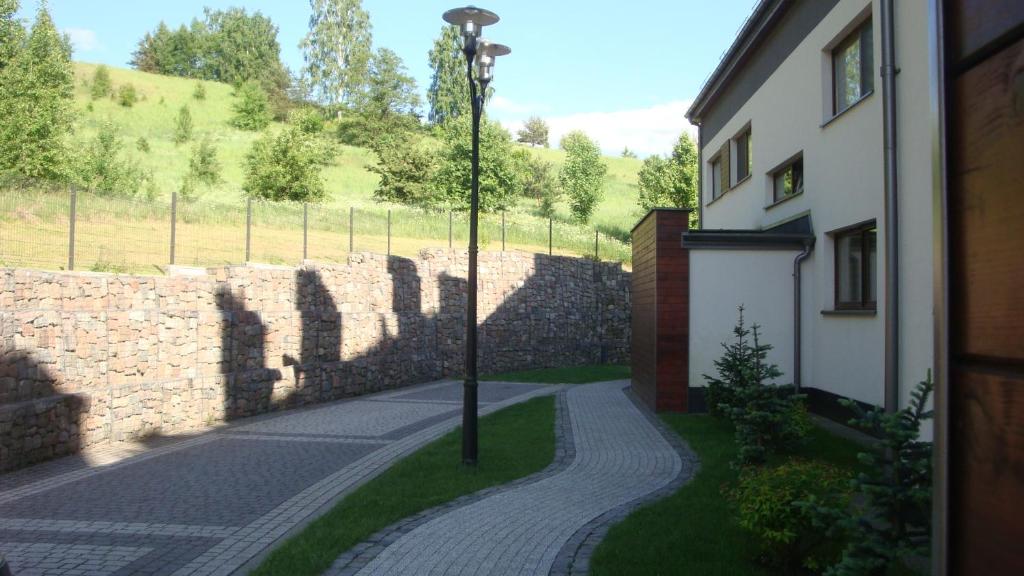 Vonkajšia záhrada v ubytovaní Apartamenty przy Stoku Mrągowo