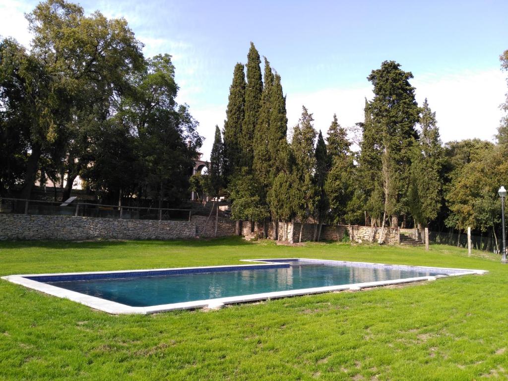 The swimming pool at or close to Hostal Rural Mas Blanc