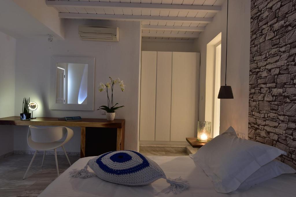 Postel nebo postele na pokoji v ubytování Hermes Mykonos Hotel