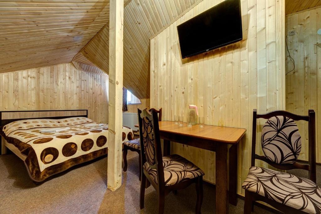 Postel nebo postele na pokoji v ubytování Villa Vlad & Spa
