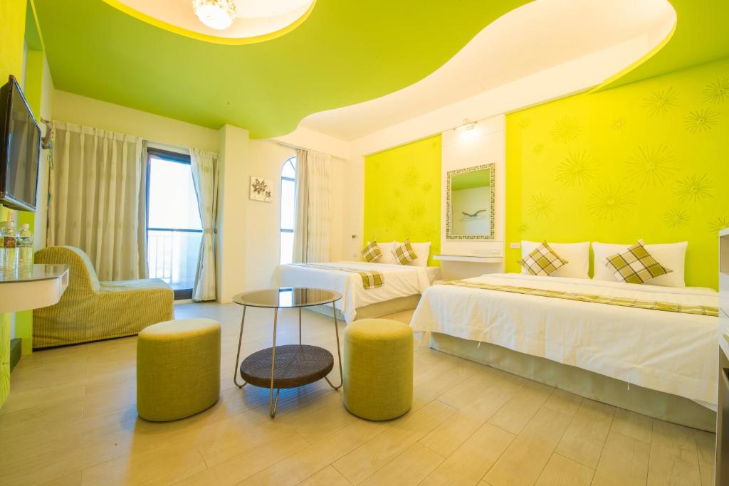 Postel nebo postele na pokoji v ubytování Sapphire Inn