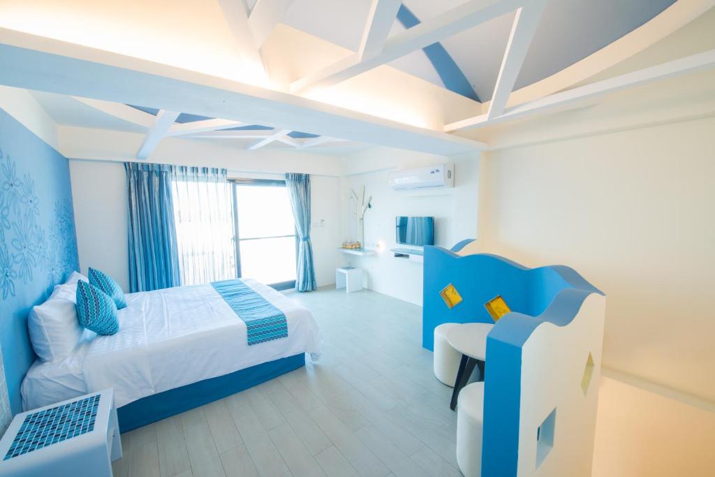 Postel nebo postele na pokoji v ubytování Sapphire Inn