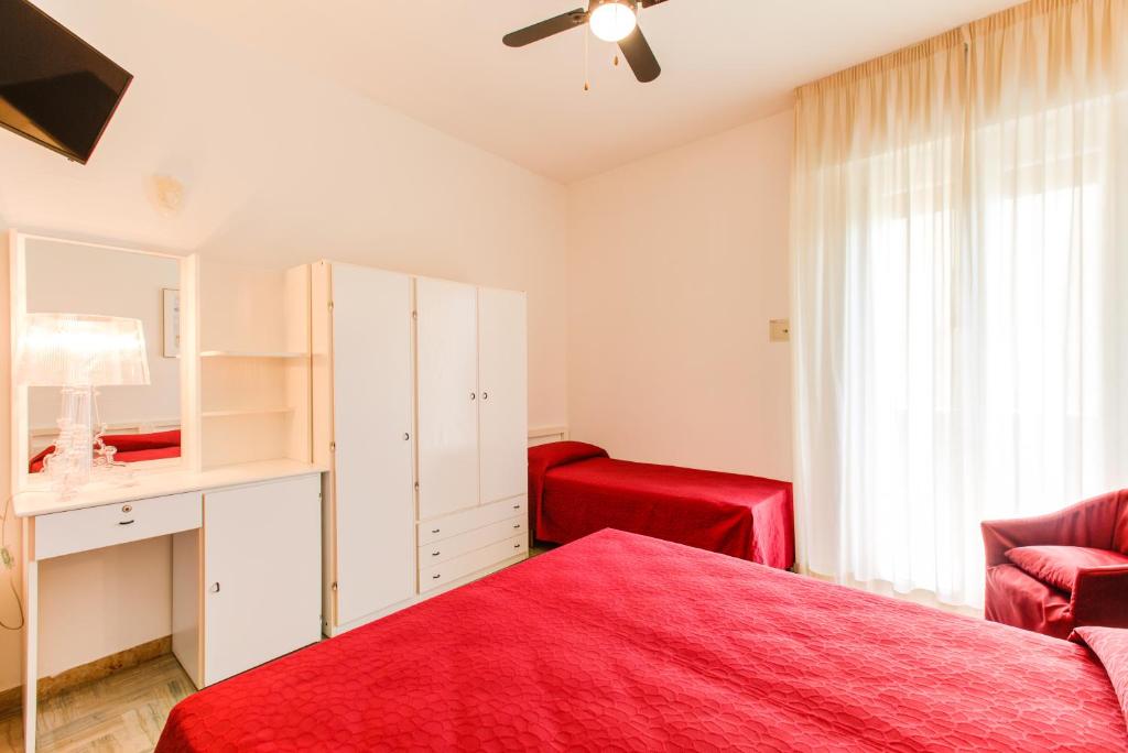 Postel nebo postele na pokoji v ubytování Hotel Splendid