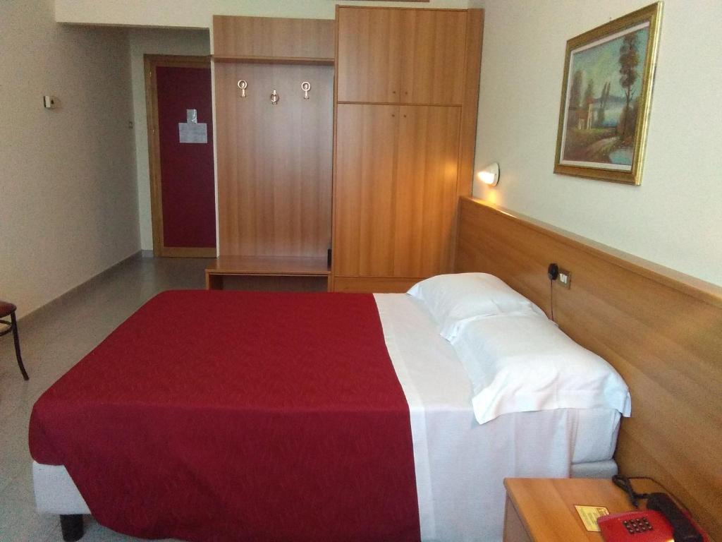 Postel nebo postele na pokoji v ubytování Hotel il Focolare