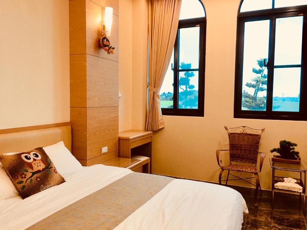 Postel nebo postele na pokoji v ubytování Sweetlight B&B