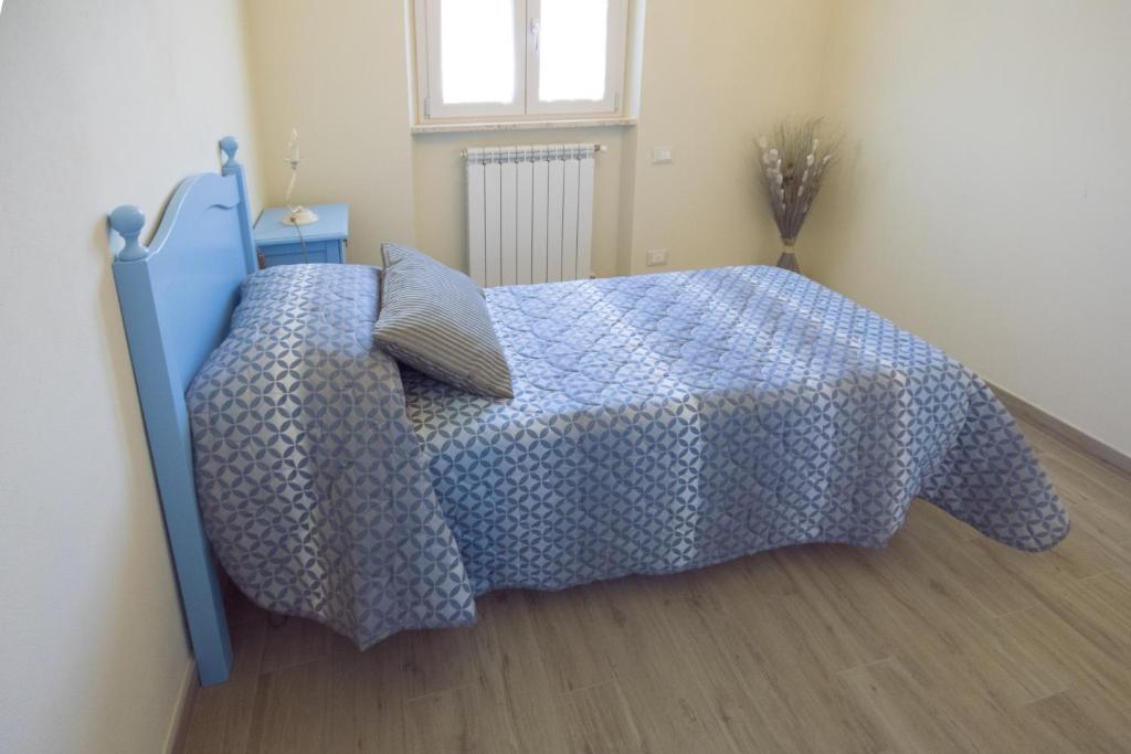 Voodi või voodid majutusasutuse Il Tremarino toas