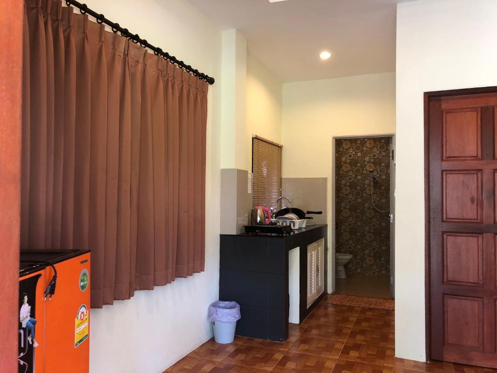 Kuchyň nebo kuchyňský kout v ubytování Baan Archa Samui