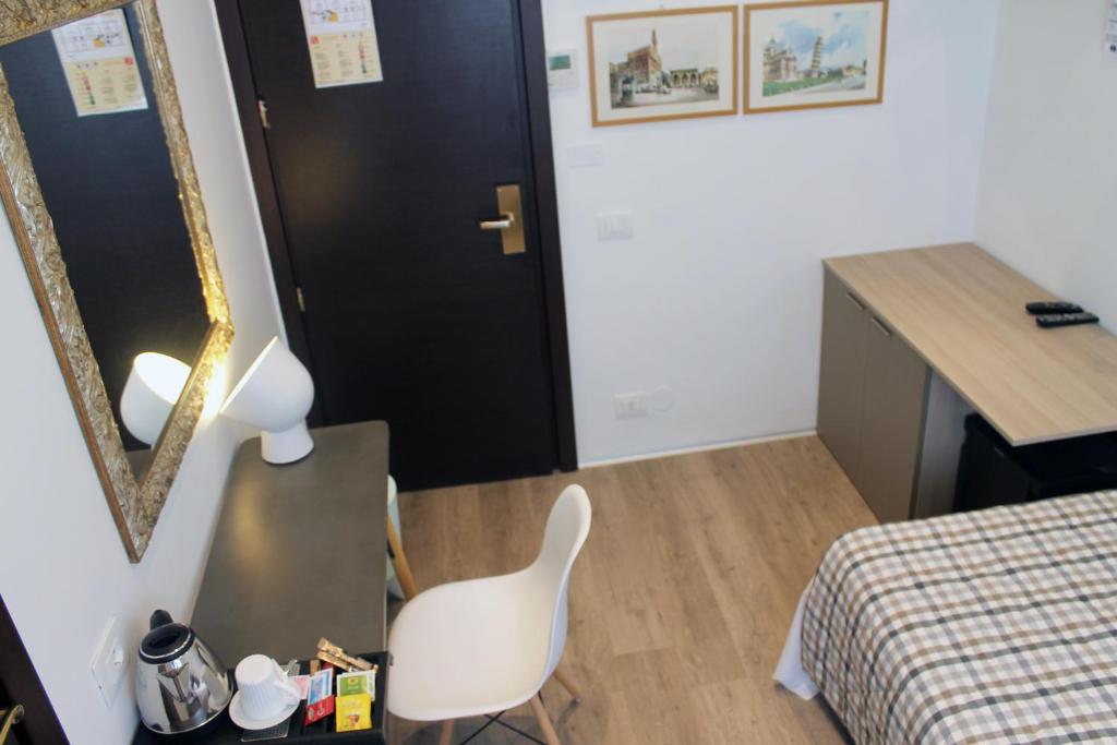 Postel nebo postele na pokoji v ubytování Hotel Bernina