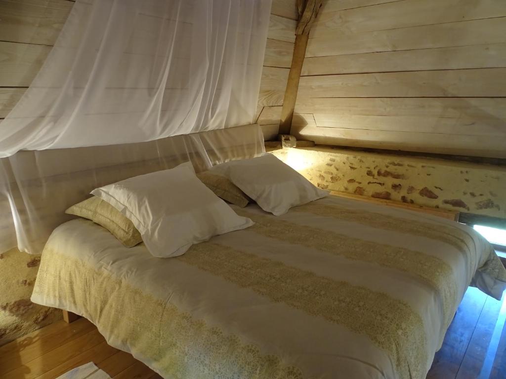 Postel nebo postele na pokoji v ubytování L'Abrejou
