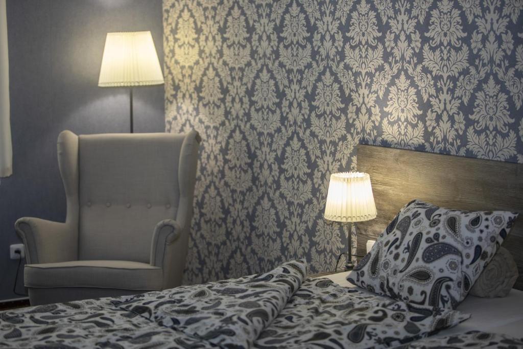 Postel nebo postele na pokoji v ubytování Restaurace Stará Lípa