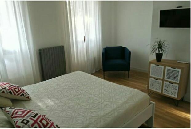 Postel nebo postele na pokoji v ubytování Ca' Cornello