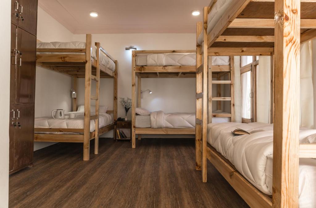 Postel nebo postele na pokoji v ubytování Ree Hostel