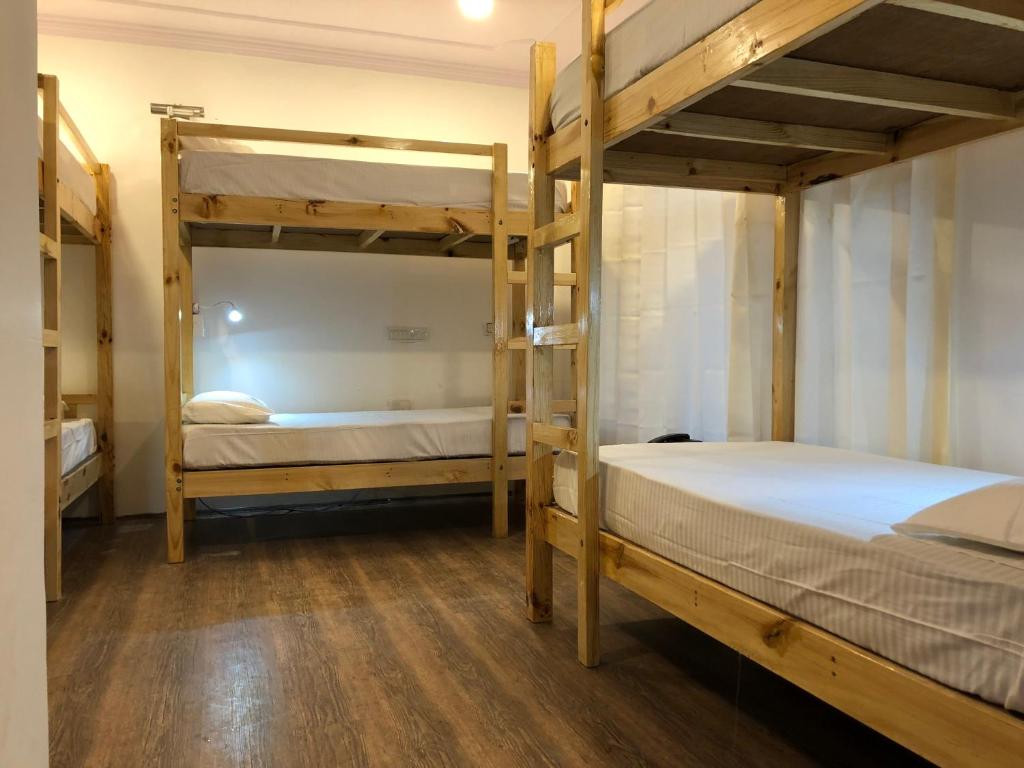 Postel nebo postele na pokoji v ubytování Ree Hostel