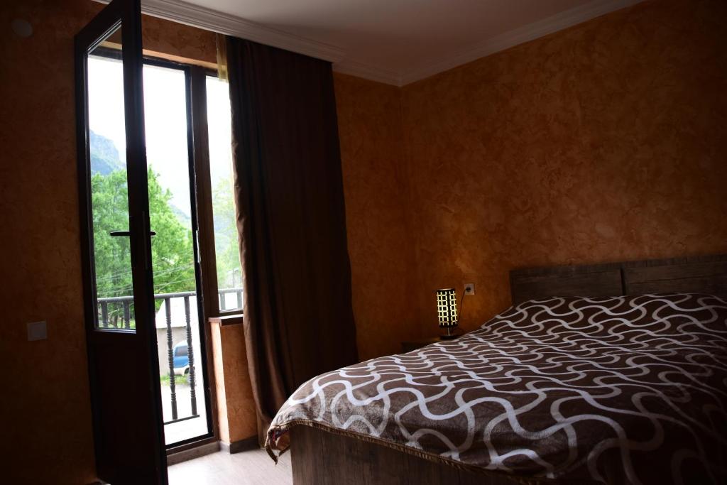 Postel nebo postele na pokoji v ubytování Maia's Guesthouse