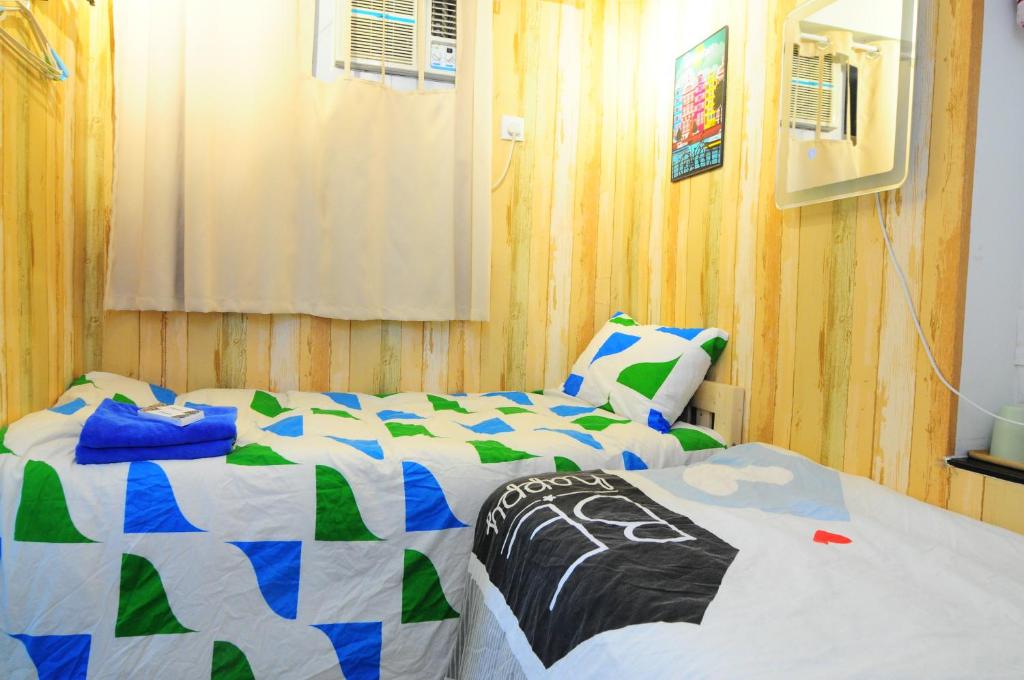Postel nebo postele na pokoji v ubytování Big Wave Travel