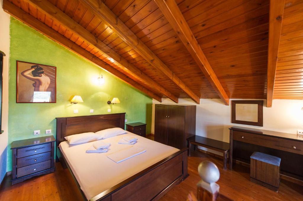 Postel nebo postele na pokoji v ubytování Villa Alexandros